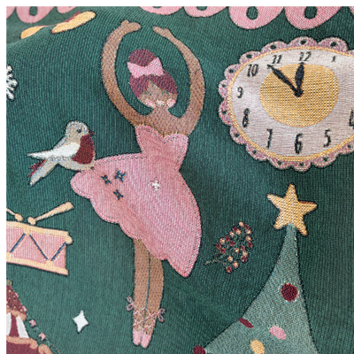 Roxy, the prima ballerina with golden tan skin and a pink bow in her hair, dancing in a pink dress beside a robin and a toy drum.